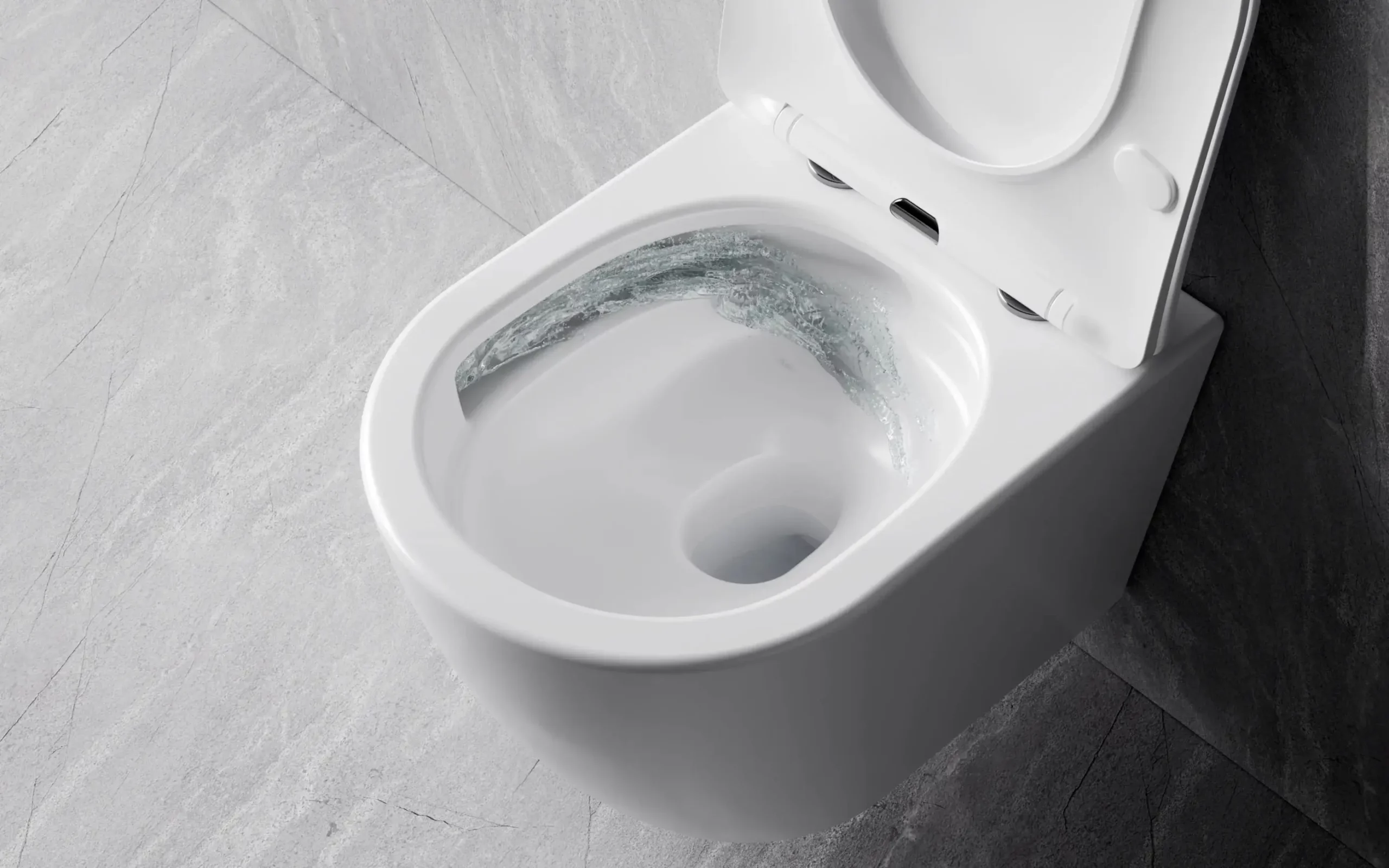 Miska WC Besco Laax White Podwieszana miska WC Besco w kolorze białym z otwartą, wolnoopadającą deską podczas spłukiwania wody.